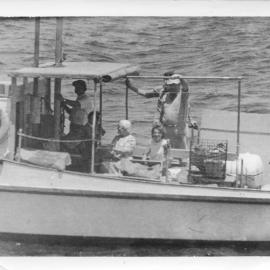 Peter Ross on the South Solitary Island supply boat Pamela Star, early 1970s