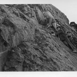 John and Mick Ross rock-climbing on South Solitary Island, early 1970s