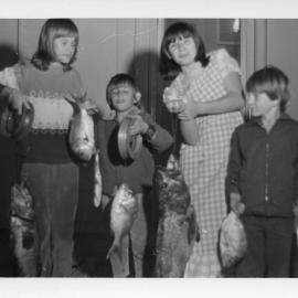 The Ross family with Mum's catch, early 1970s