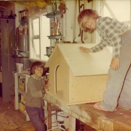 Pete and John Ross build a kennel on South Solitary Island, early 1970s