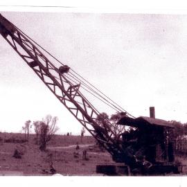 An early crane on the jetty foreshore