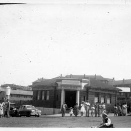 The Billy Cart Derby passes the Jetty Post Office, 21 October 1950