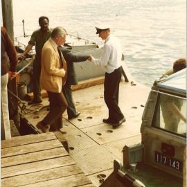 Men boarding an Army duck, Coffs Harbour Jetty, 1970s