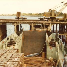 Naval landing vessel moored at Coffs Harbour Jetty, 1970s