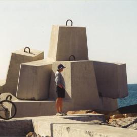 Person standing at South Breakwall, Coffs Harbour
