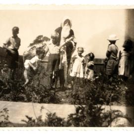 Photograph of children with Santa Claus