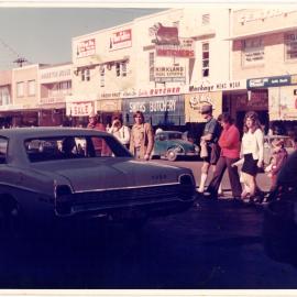 People crossing High Street, Coffs Harbour, c. 1980s