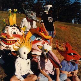Large group of children wearing homemade masks, 1996