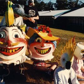 Large group of children wearing homemade masks, 1996