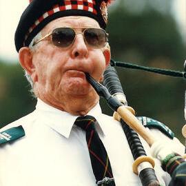 Bagpipe player, 1996