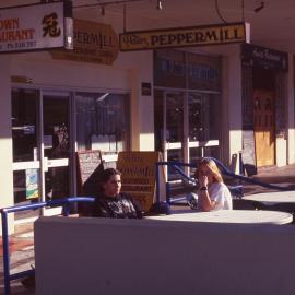 Students sitting at the Jetty Strip
