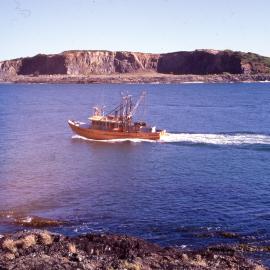 Fishing boat leaving the harbour