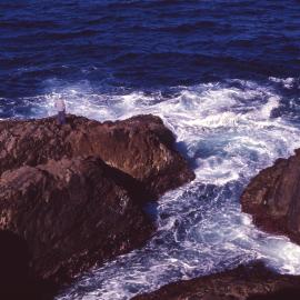Fisherman on the rocks