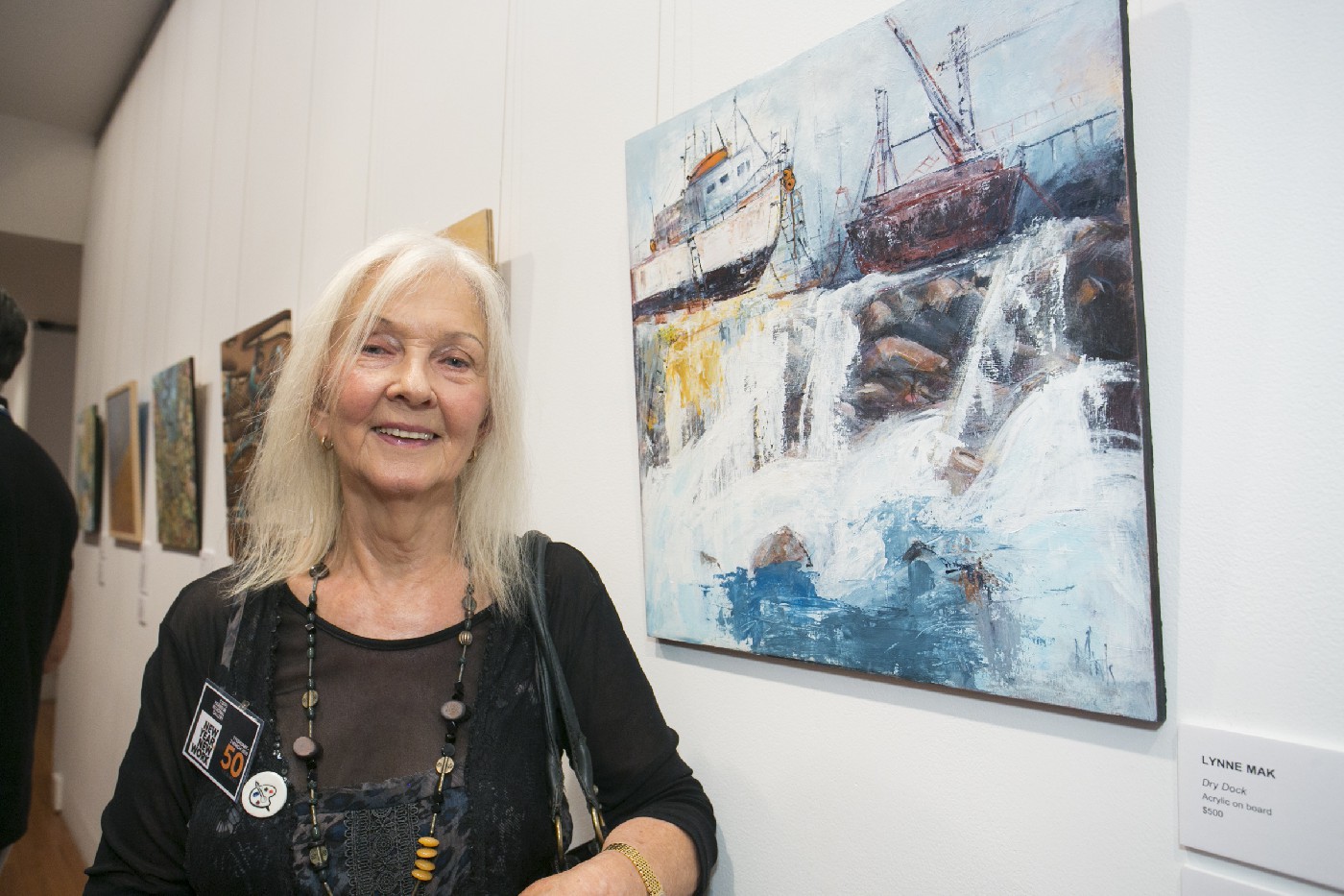 Lynne Mak with her piece 'Dry Dock' at the New Year, New Work exhibition. Photographed by Jamie Williams.